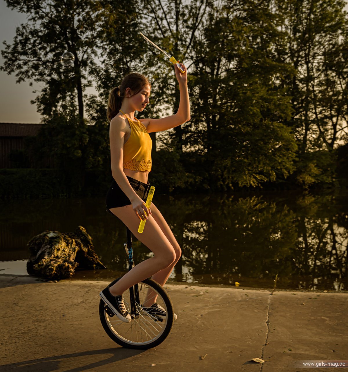 Girls Mag Annika Bubbles on a Unicycle 0120 5828013916.jpg