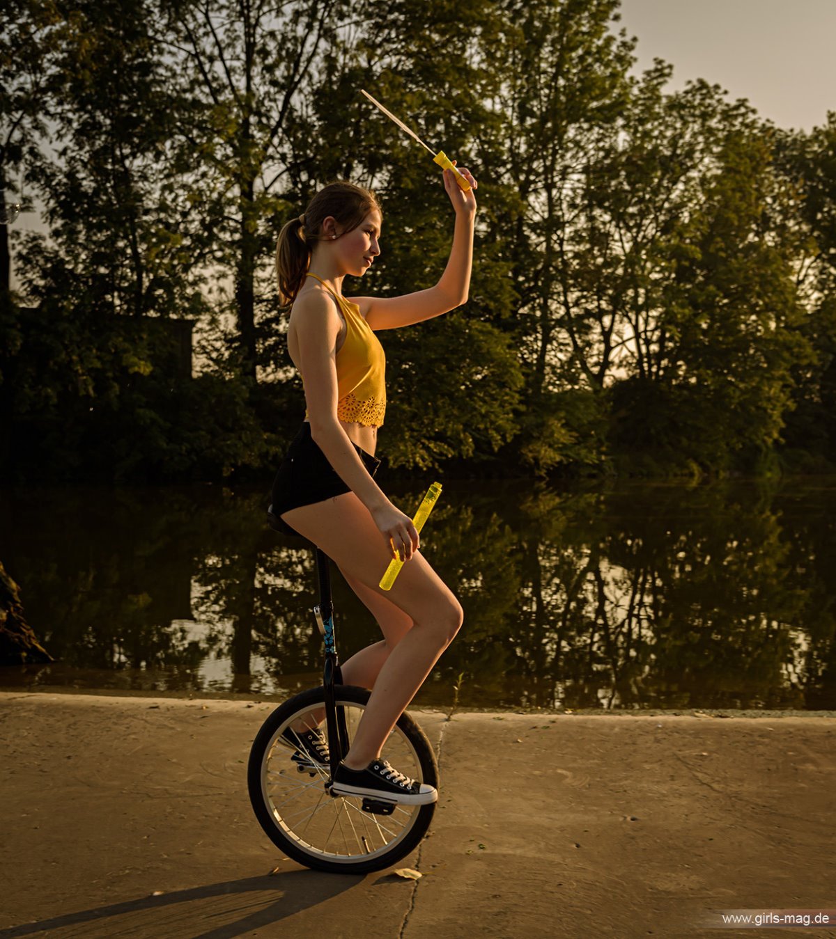Girls Mag Annika Bubbles on a Unicycle 0121 0988565122.jpg